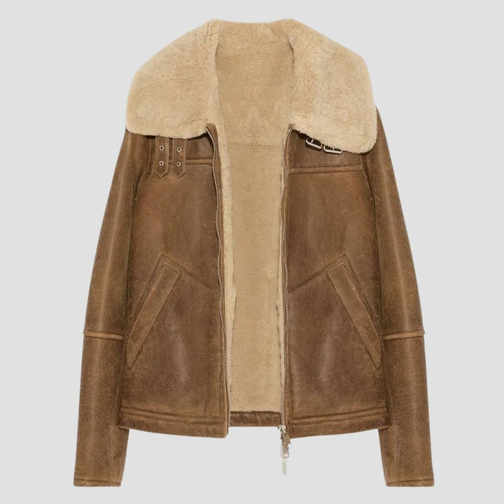 A timeless winter essential, this brown fur leather jacket offers both luxury and warmth for those chilly days.