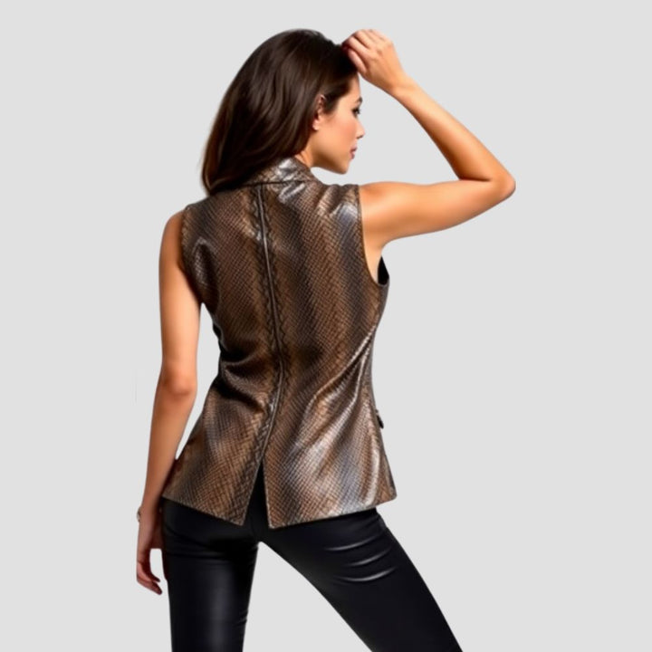 A fashionable snakeskin leather vest for women, designed for those who love to incorporate bold and unique pieces into their style.