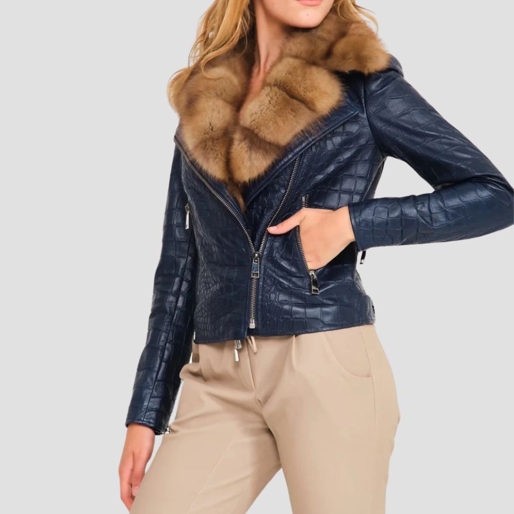 This unique crocodile leather jacket is designed for women who love bold, versatile fashion. The textured leather adds flair to any outfit, from jeans to dresses.