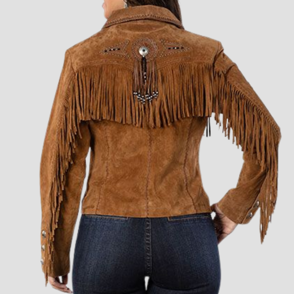  This vintage Western suede leather jacket for women is perfect for those who love a classic Western look. The fringe details and soft suede material combine to create a stylish, rustic jacket.