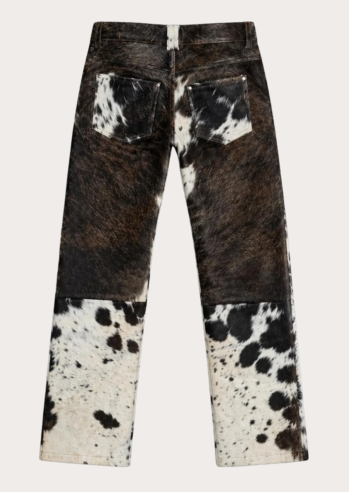 Hair on hide cowhide leather pants featuring a natural black white and brown pattern