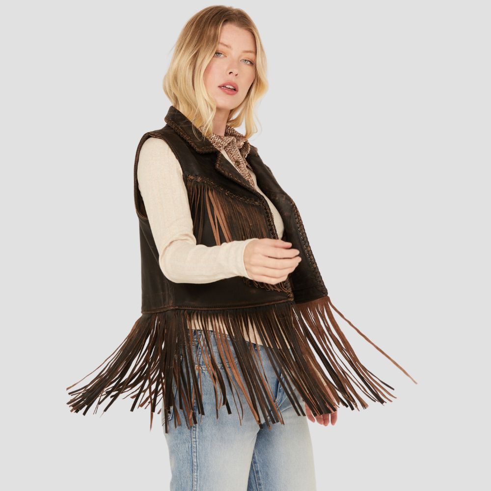 Women’s fringed leather vest, combining western and boho chic elements, ideal for those looking to make a bold, stylish statement with fringe detailing.