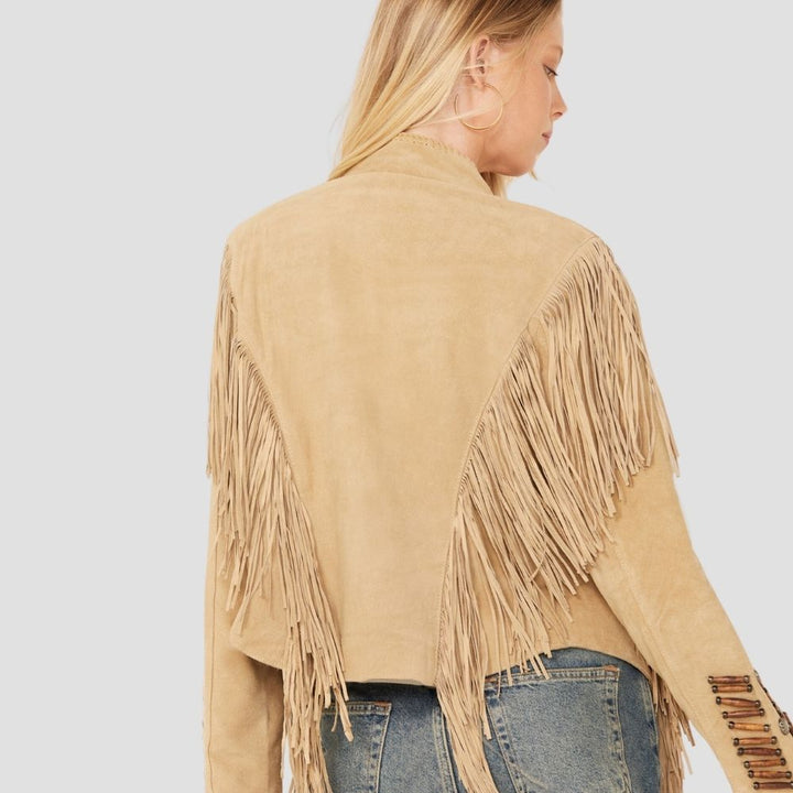 Discover a trendy women’s Western suede jacket with fringe and tassels. This jacket combines the timeless look of suede with bold fringe and tassel details, making it a standout piece.