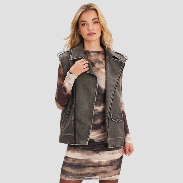 Women's vintage leather vest with retro detailing, offering a timeless look that blends nostalgic charm with contemporary fashion.