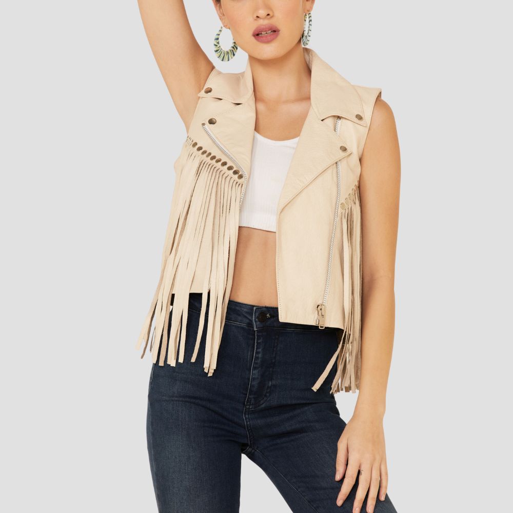 Women’s leather vest with long fringes and stud details, creating a unique cowgirl-inspired fashion statement for a trendy, bold look.