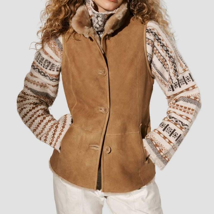 Suede sherpa fur vest for women, offering a luxurious feel and practical warmth for stylish winter layering.