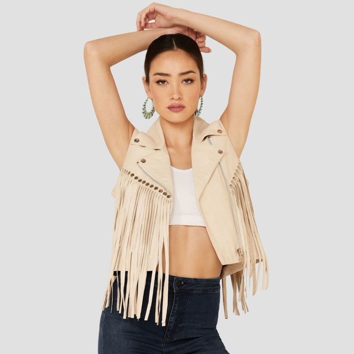 Long fringes leather vest for women with studs, perfect for a cowgirl-inspired look, adding flair and bold style to your outfit.