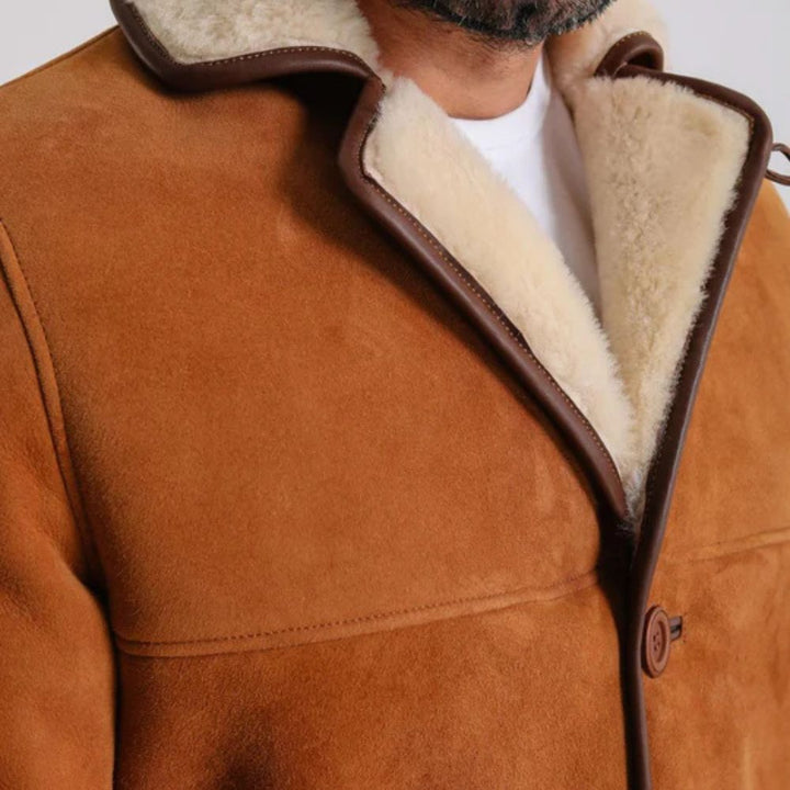 Stylish brown suede jacket with faux wool fur for extra warmth.